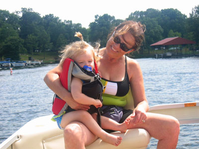We went out on the pontoon again to go for a swim. This time Baby 2 was just barely brave enough to sit with Aunt Cheryl Dawn up front.